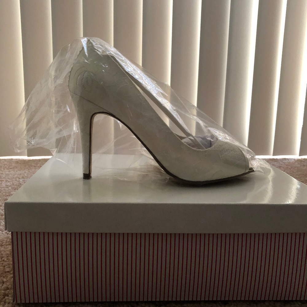 Rainbow Club ivory lace peep toe stilettos